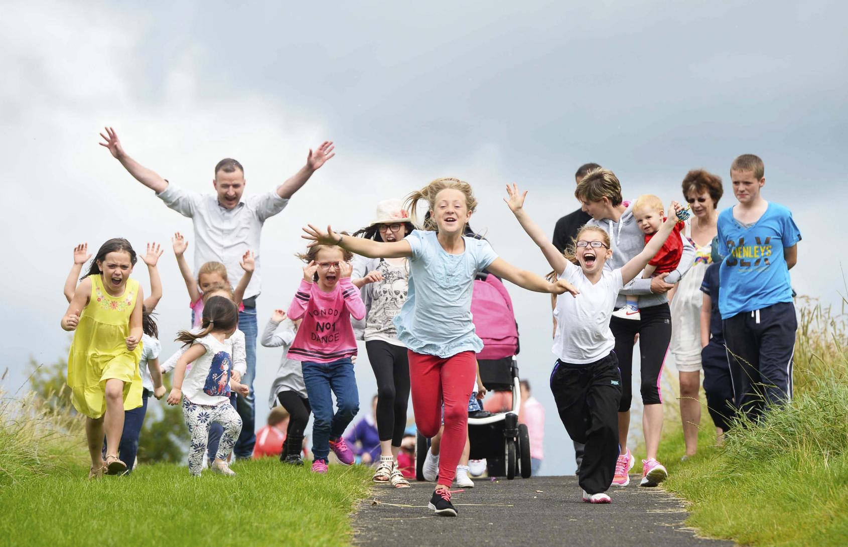 Children running at The Cornfield Project Children running at The Cornfield Project