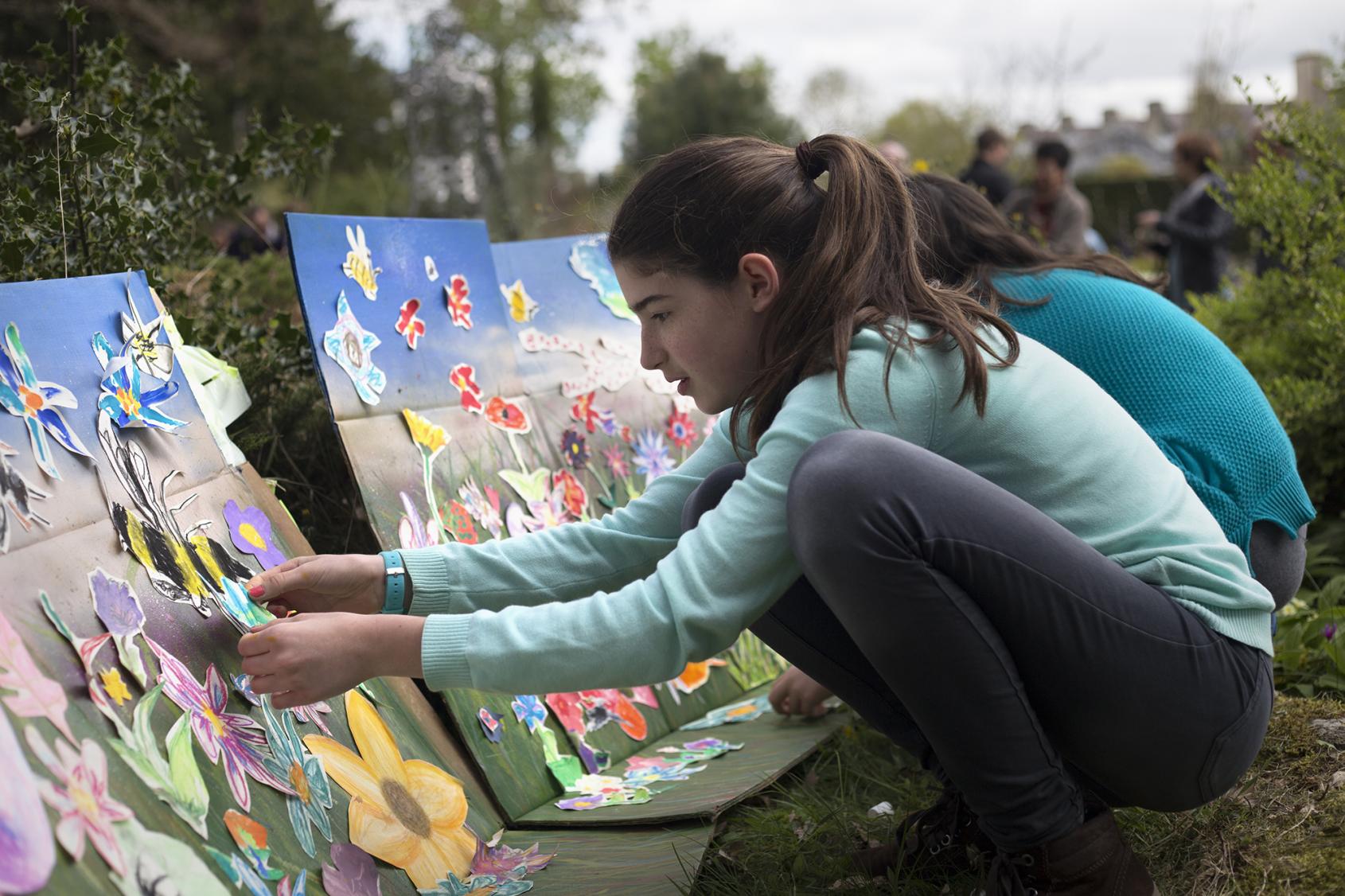Girls creating wildflower art Girls creating wildflower art